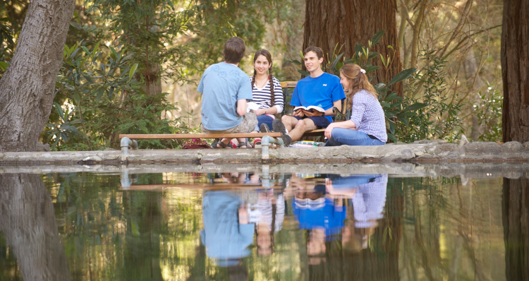 Students by the campus ponds