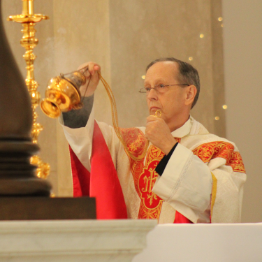 Rev. Stephen Brock incenses the altar