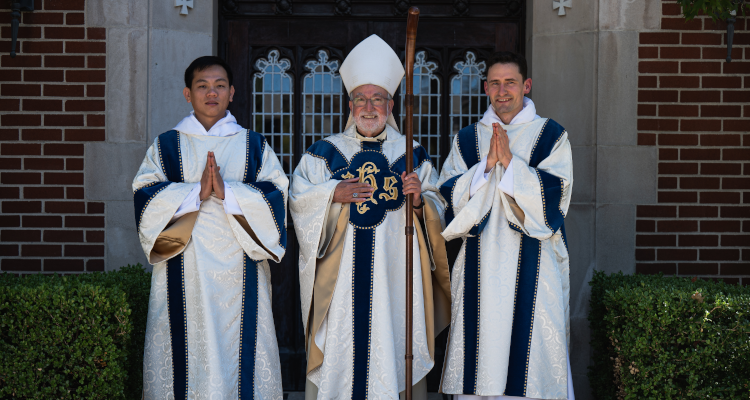 The newly-ordained with the Bishop