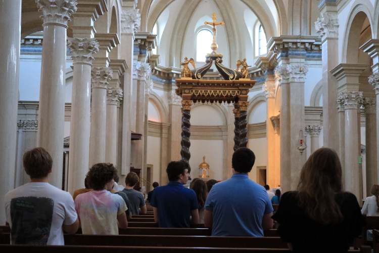 Students pray the rosary