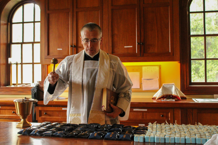 California Head Chaplain Rev. Robert Marczewski, blesses the medals and the Rosaries that will be distributed at the California President’s Dinner …