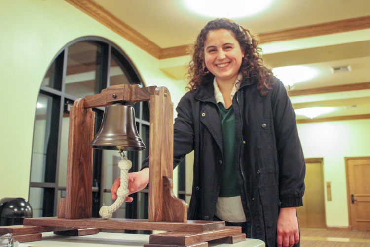 A senior rings the bell