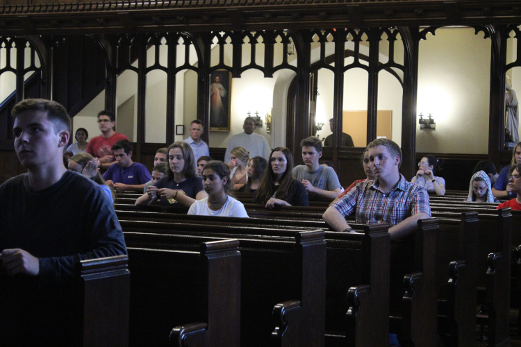 Students pray the Rosary in the Chapel