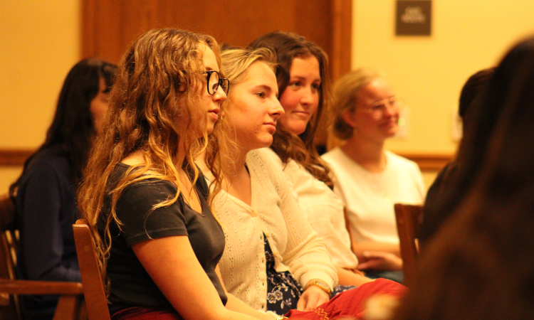 Students listen to talk from the Marian sisters