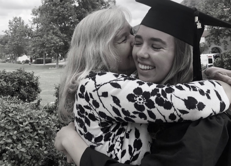 Cecilia Walsh (’21) hugs her mother, Annie (Tobias ’89), at Commencement 2020