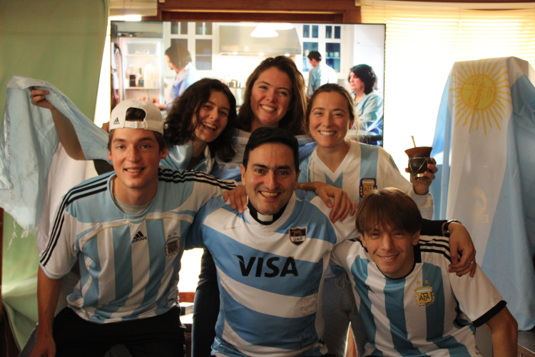 Fr. Jorge cheers with other Argentina fans
