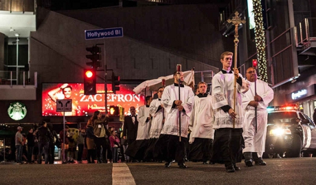 A group of Los Angeles priests and seminarians leading a Euc