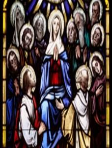 Mary and the Apostles gathered in prayer