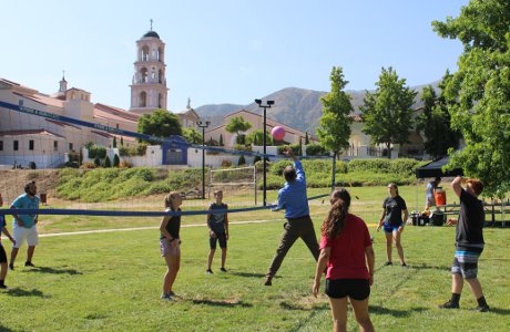 Jon Daly spikes a volleyball