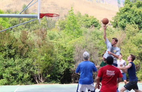 Students play basketball