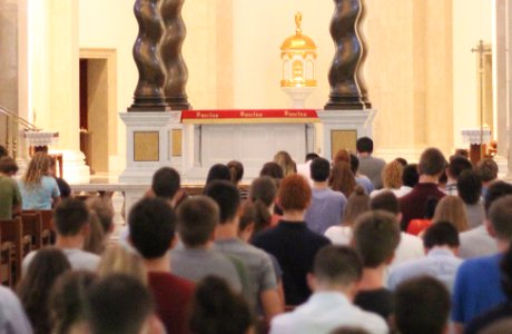 Students pray the Rosary in Our Lady of the Most Holy Trinit