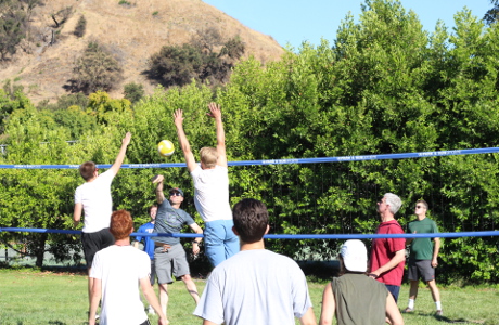 Students play volleyball