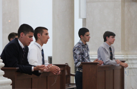 Students praying the Rosary