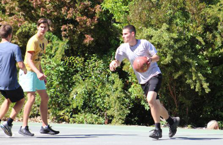 students playing basketball