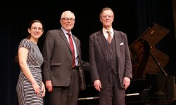 Catherine Mires (’10), President Michael F. McLean, and Pete