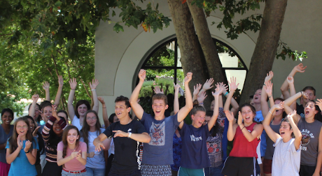 High School Summer Program students jump for joy