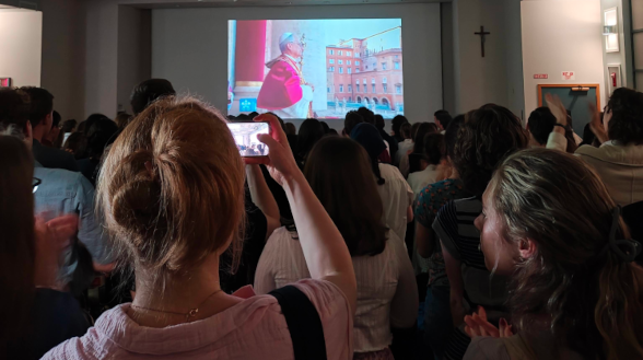 Students celebrate the elevation of Pope Leo XIV