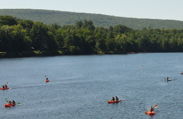 Students kayak along the Connecticut River