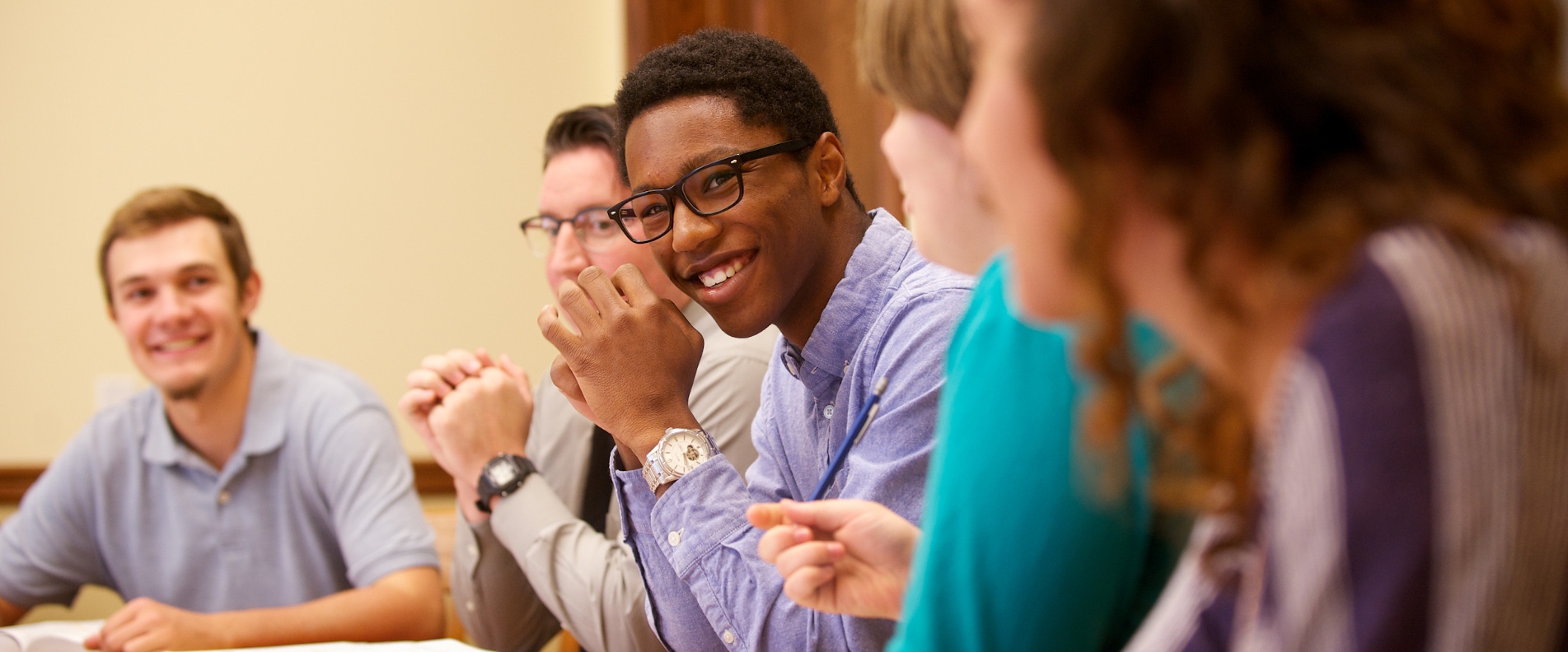 Students talk at table