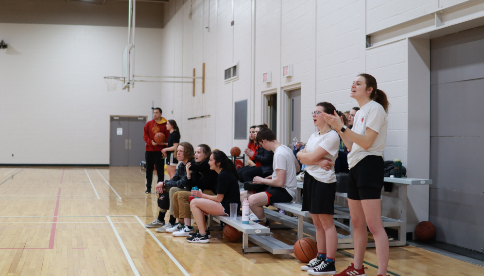 Students play basketball