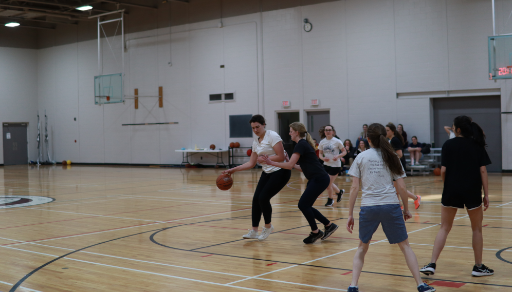 Students playing basketball