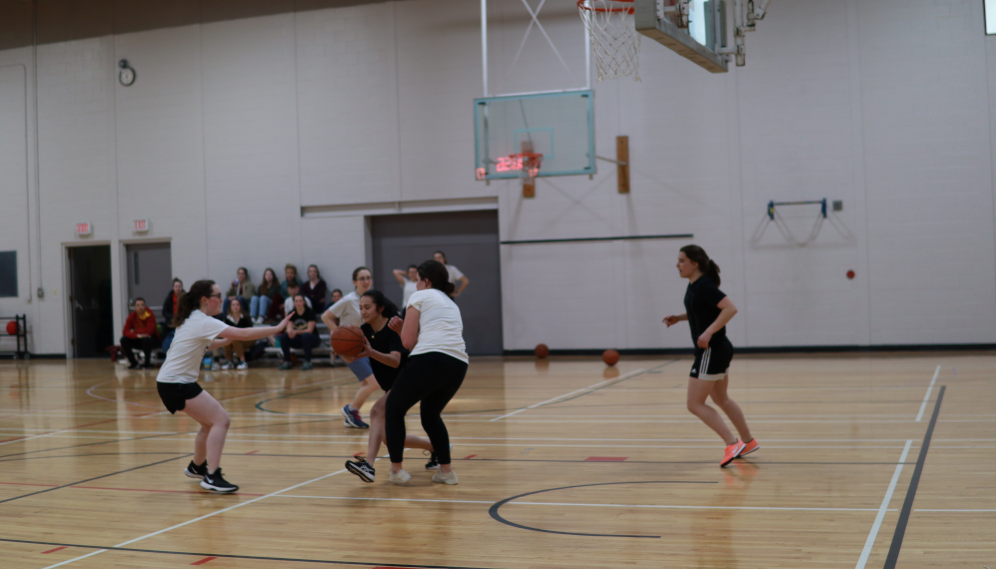 Students playing basketball