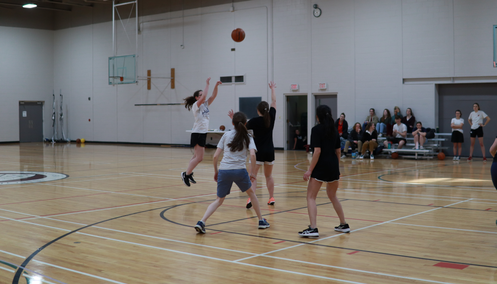 Students playing basketball