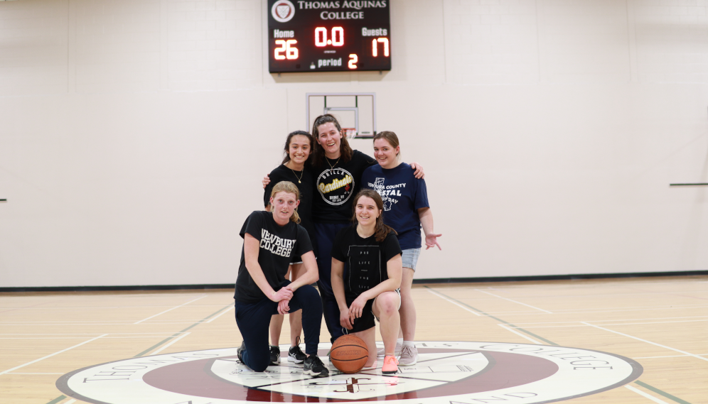 Students playing basketball