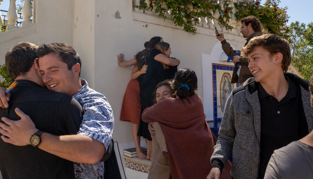 Seniors congratulate each other after finishing their finals