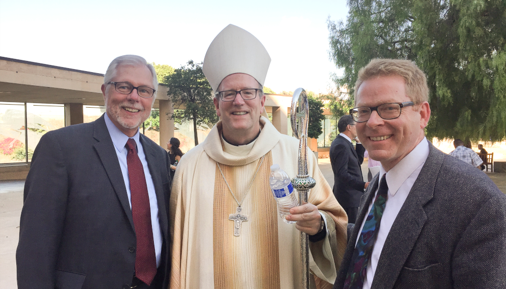 College President Michael F. McLean and Dean Brian Kelly visit with Bishop Barron after his 2015 installation as Auxiliary Bishop of Los Angeles.