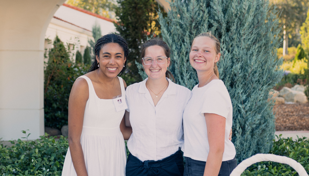 Three of the servers pose for a picture