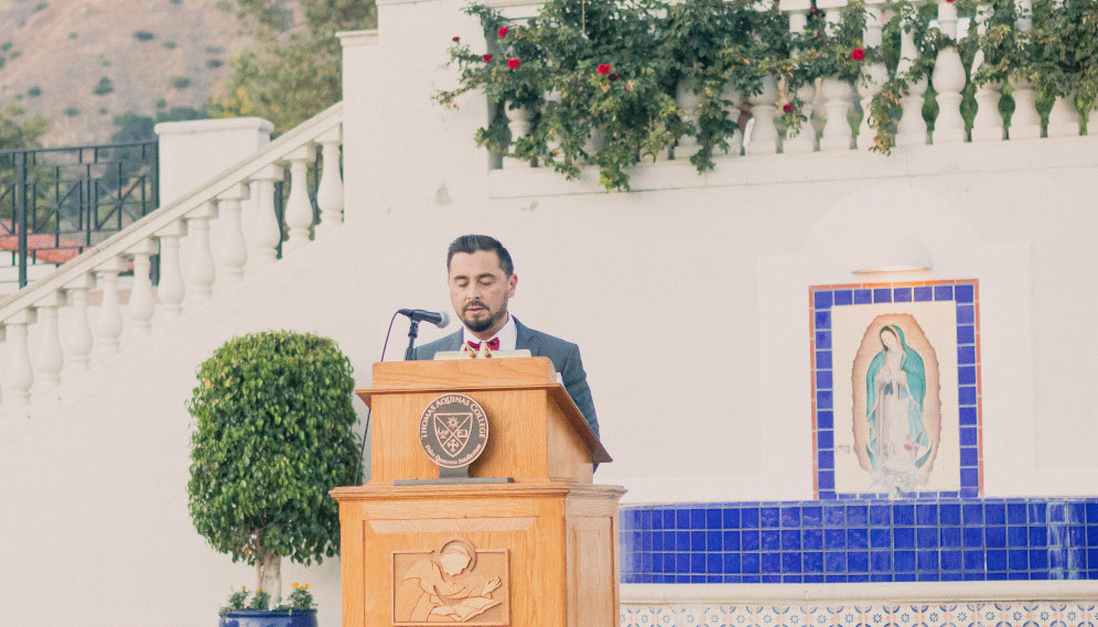 One of the alumni gives a speech