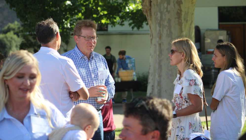 Tutor Brian Kelly chats with some of the HSSP family members