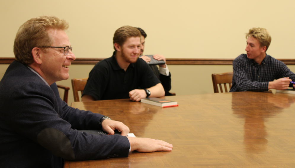 In another section, the tutors chats with students pre-seminar