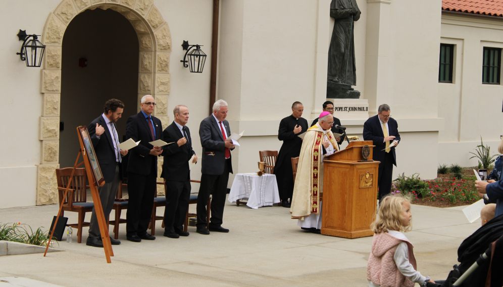 The assembled led in prayer by the Archbishop