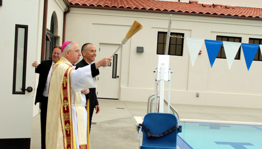 The Archbishop blesses the pool