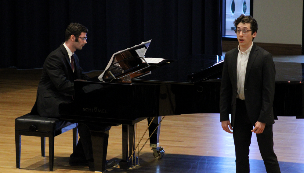 A singer and pianist perform 