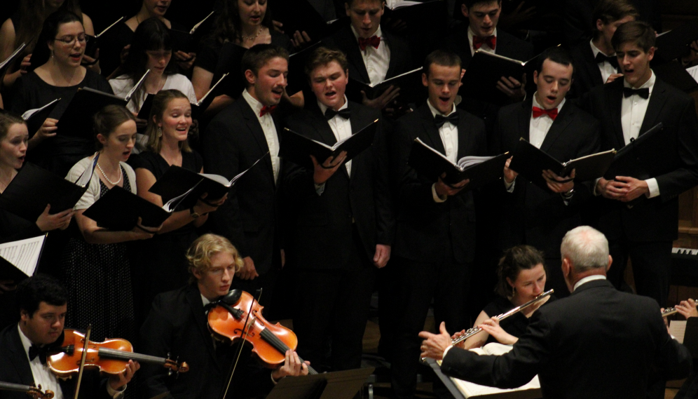 Mr. Grimm conducts the choir and musicians