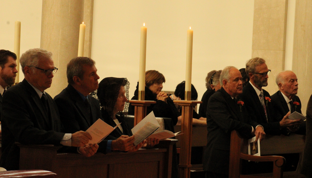 The congregation kneels