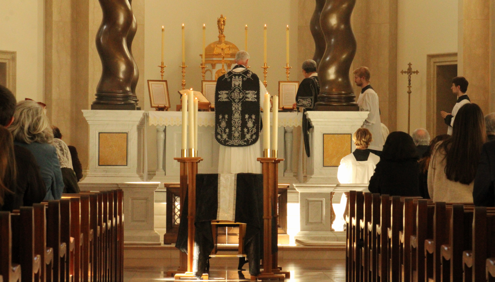 A view down the aisle of Fr. Walshe celebrating the Mass