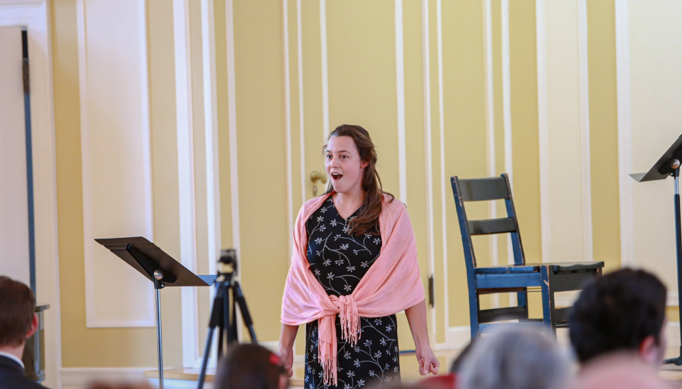 A student sings solo