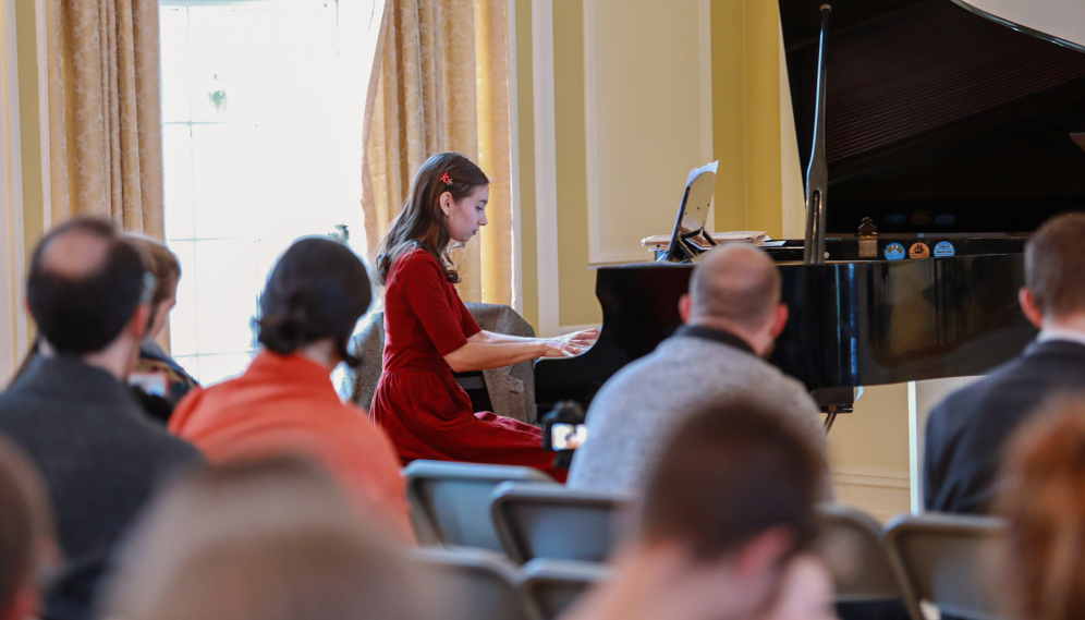 A student performs on the piano