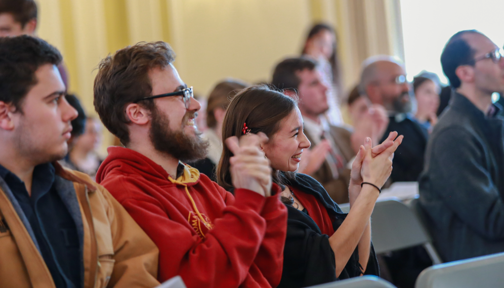 Enthusiastic applause from the audience