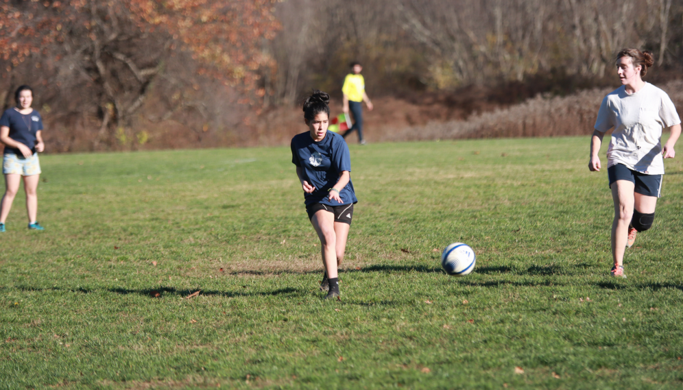 Two on either side of the ball