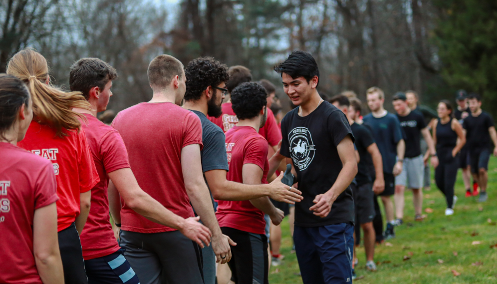 Students line up for the post-game handshakes