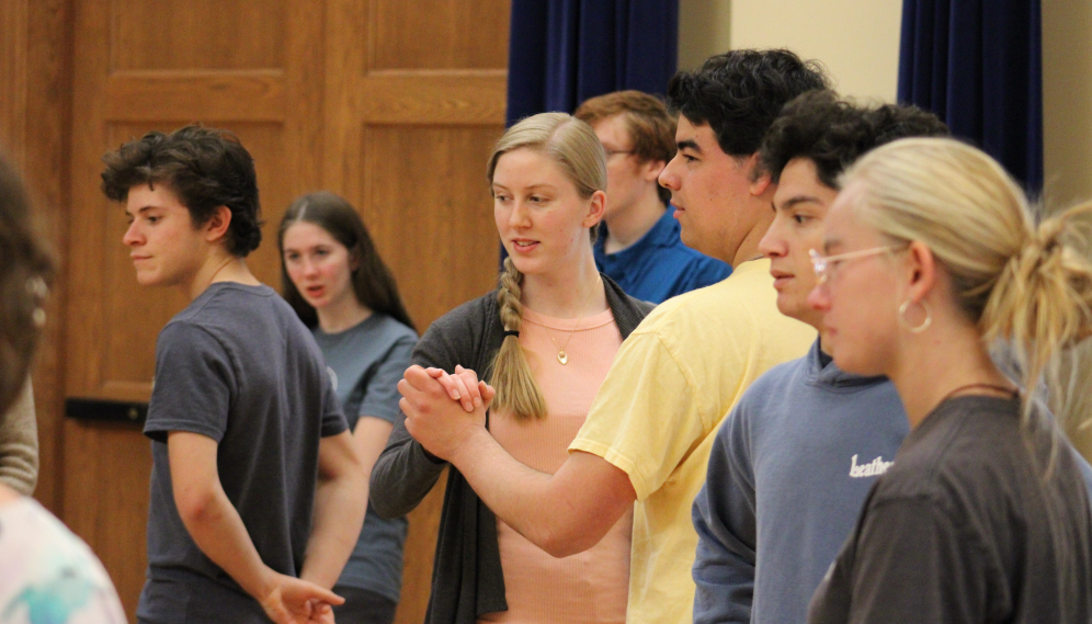 Students watch the dancing demonstration