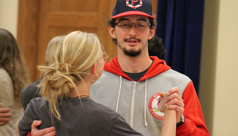 A student pair dancing