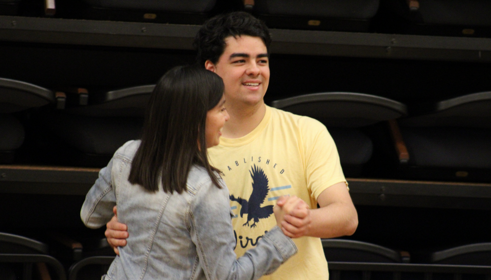 A student pair dancing