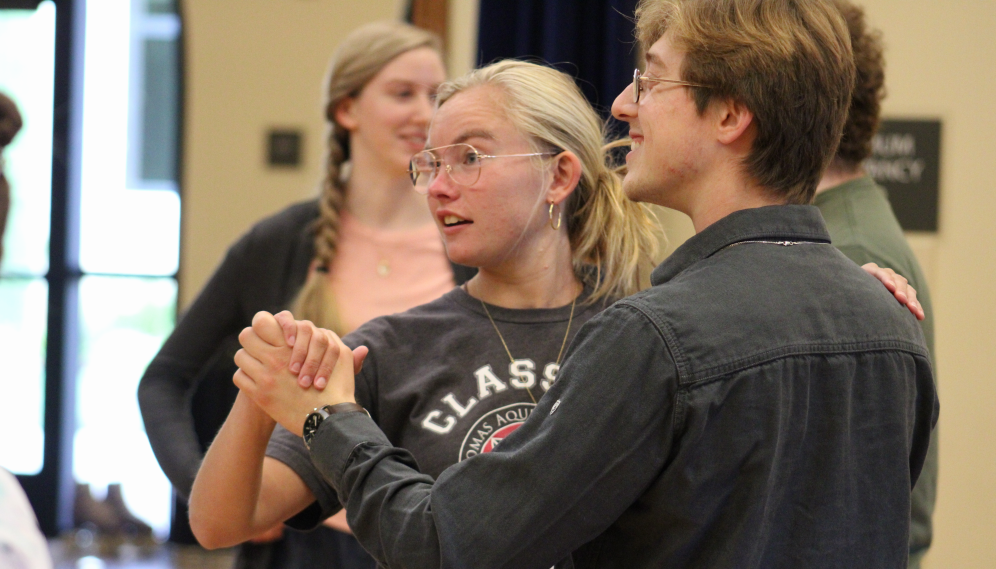 A student pair watching the demonstration