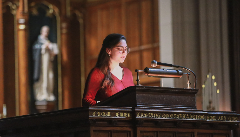 A student reads one of the lessons